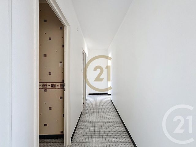 Afficher la photo en grand Appartement F3 à vendre - 4 pièces - 87.34 m2 - LURE - 70 - FRANCHE-COMTE - Century 21 Gsm Immo
