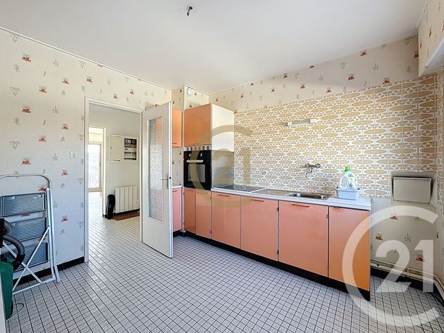 Afficher la photo en grand Appartement F3 à vendre - 4 pièces - 87.34 m2 - LURE - 70 - FRANCHE-COMTE - Century 21 Gsm Immo
