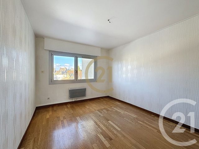 Afficher la photo en grand Appartement F3 à vendre - 4 pièces - 87.34 m2 - LURE - 70 - FRANCHE-COMTE - Century 21 Gsm Immo
