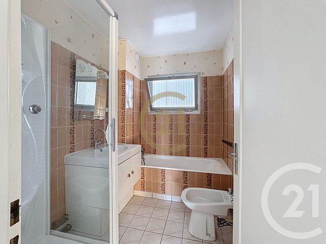 Afficher la photo en grand Appartement F3 à vendre - 4 pièces - 87.34 m2 - LURE - 70 - FRANCHE-COMTE - Century 21 Gsm Immo