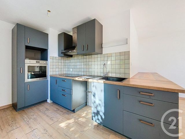 Appartement F4 à louer - 4 pièces - 89.38 m2 - LUXEUIL LES BAINS - 70 - FRANCHE-COMTE - Century 21 Gsm Immo