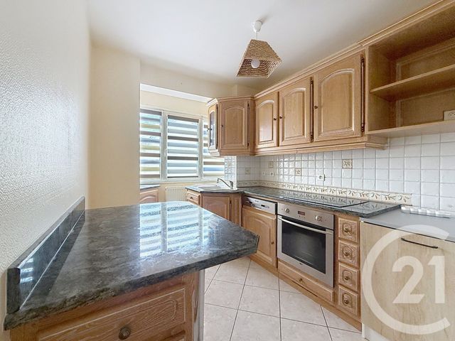 Appartement F4 à louer - 4 pièces - 71.44 m2 - LUXEUIL LES BAINS - 70 - FRANCHE-COMTE - Century 21 Gsm Immo