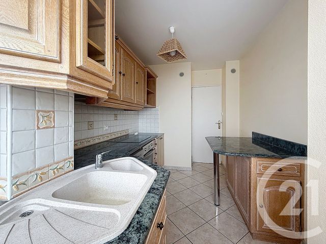 Appartement F4 à louer - 4 pièces - 71.44 m2 - LUXEUIL LES BAINS - 70 - FRANCHE-COMTE - Century 21 Gsm Immo